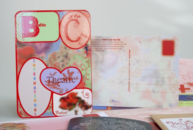 Picture of Baltic Circle's postcard with various shapes on a floral background: ovals, square areas and a heart. Different texts are written inside the areas: "Baltic", "Circle", "Theatre", "festival" and "international".